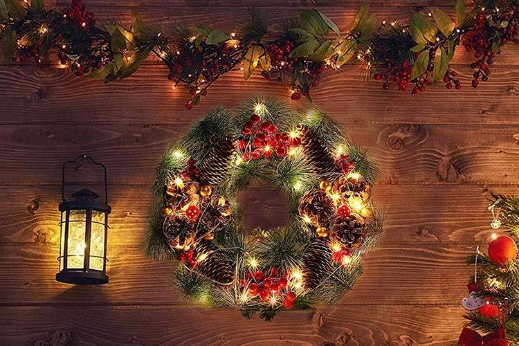 Outdoor Christmas Wreaths With Lights hanging on a wall