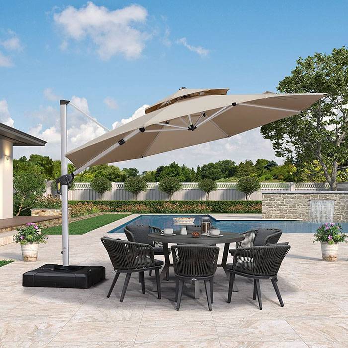 Purple Leaf -Overhanging Parasol and Garden Table and Chairs by a Pool