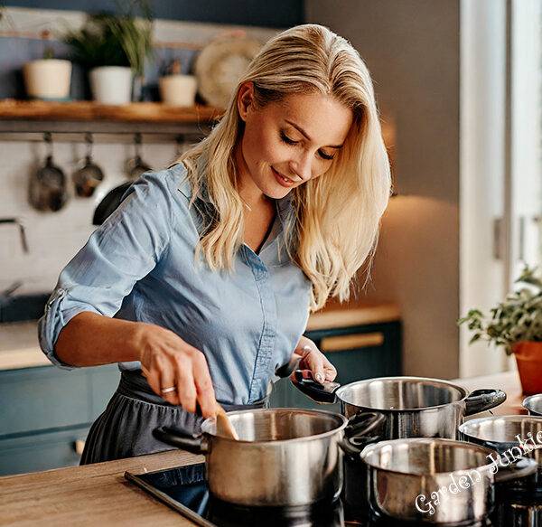 Blonde Lady using PFAS Free Cookware in a Kitchen